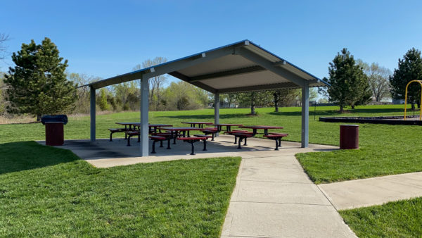 shelter with picnic tables at aquatic center