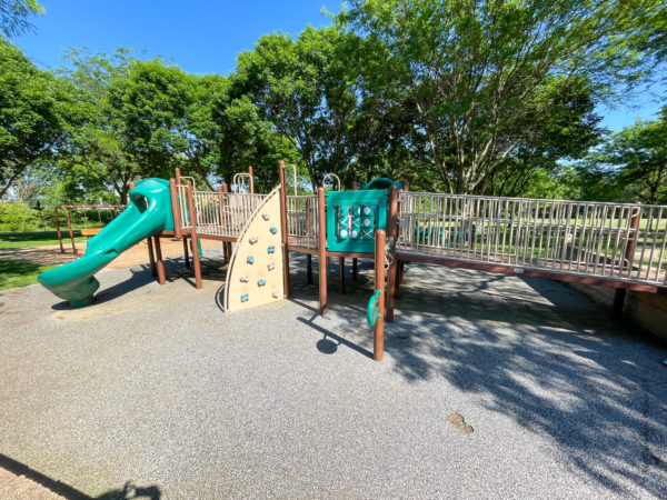 Rock climber, playground slide at Ad Astra
