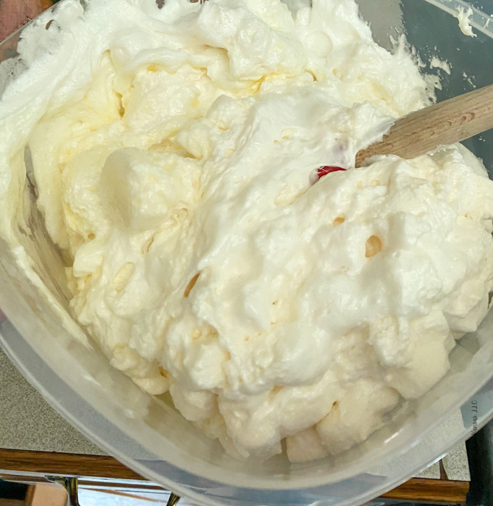 melted marshmallows, butter, and oil in plastic container
