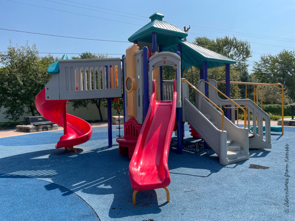red slide at water tower playground