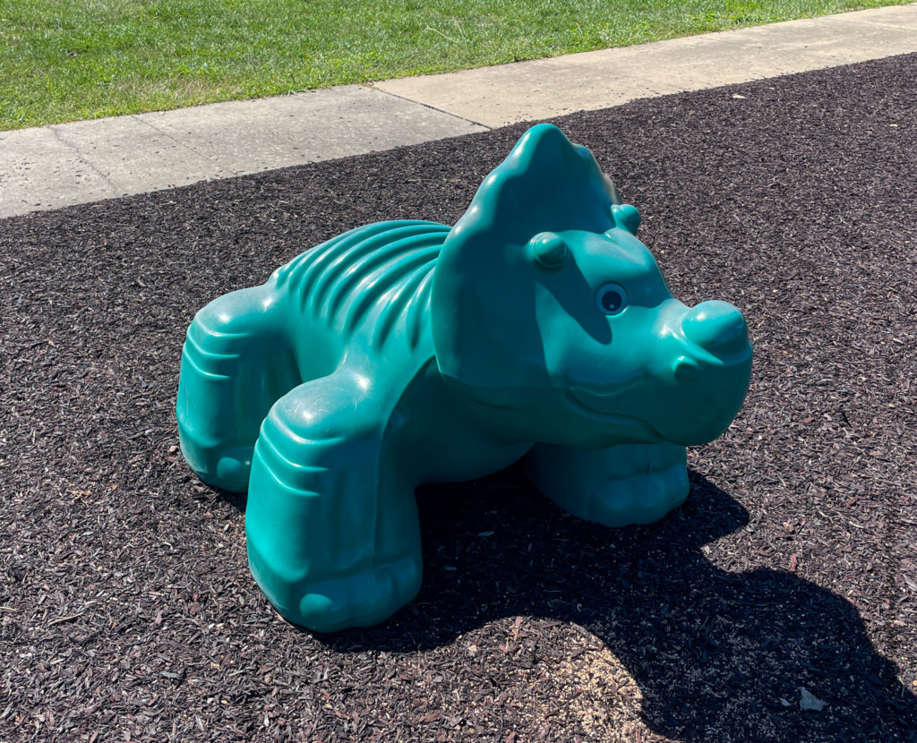 dino at stump playground