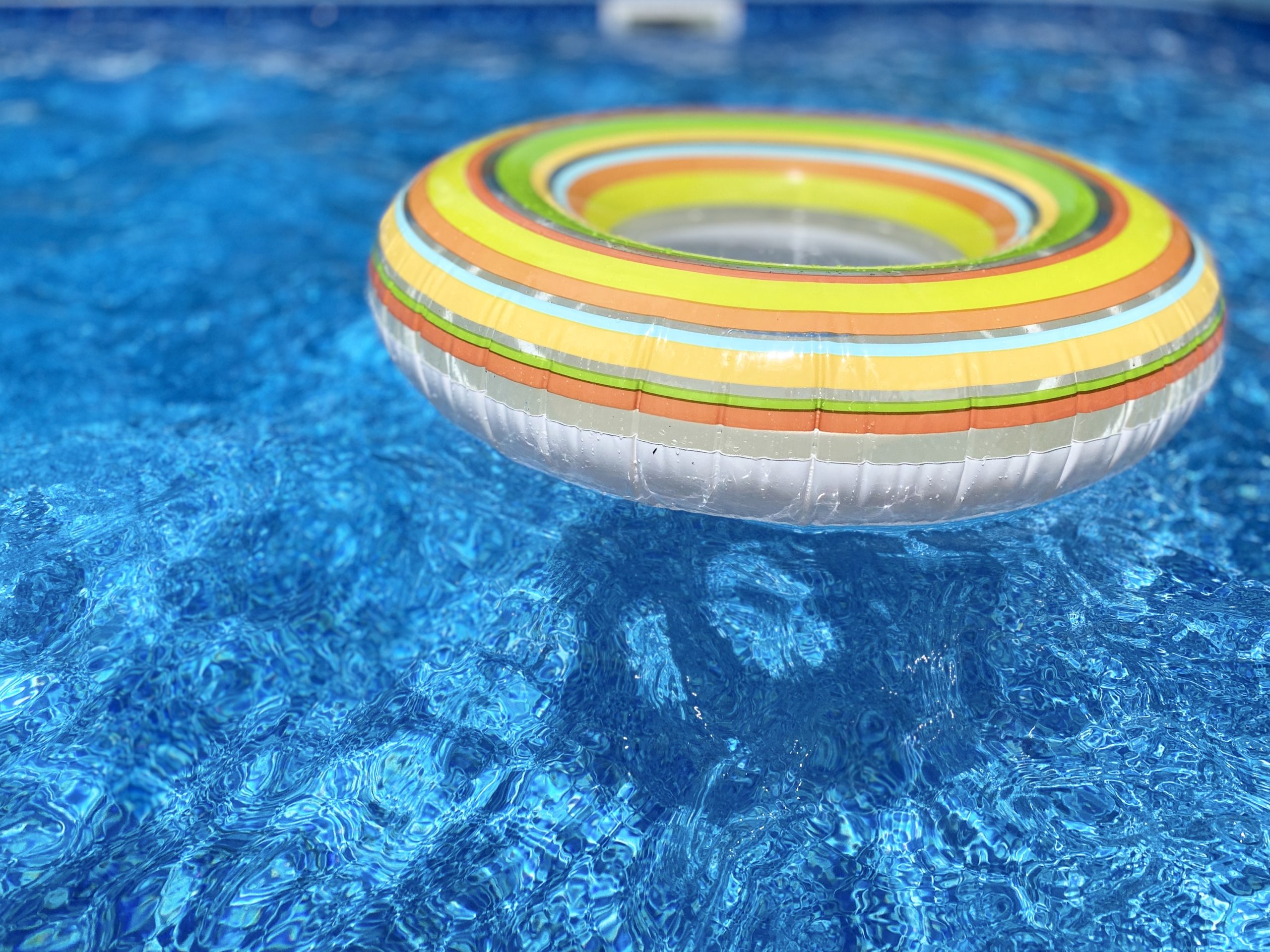 summer inter tube floating on the water