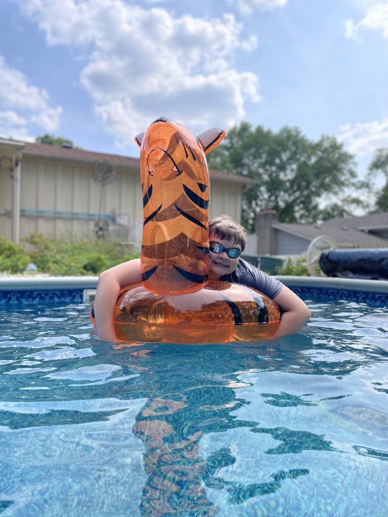 Tiger pool float in the water